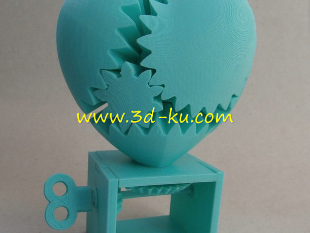 旋转齿轮心形状的零件模型的图片1