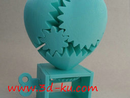 3D打印模型旋转齿轮心形状的零件的图片